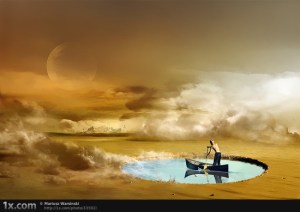 IanPunnetLinkManInBoatOnDesert